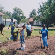 kids and adults preparing to plant