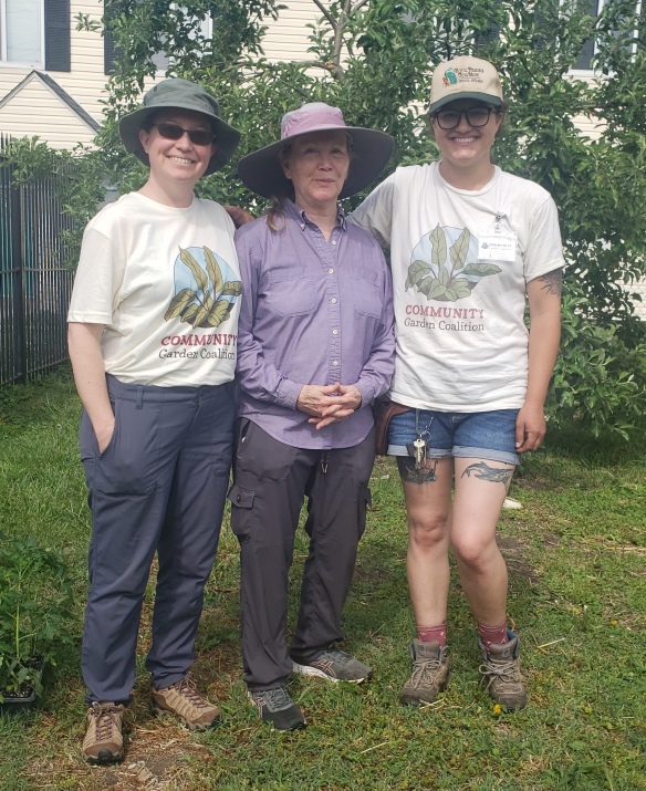 CGC board members pose together during an event at a community garden